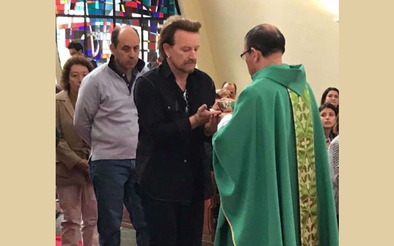 U2's Bono (Mistakenly?) Receives Eucharist at Mass After Concert in Colombia