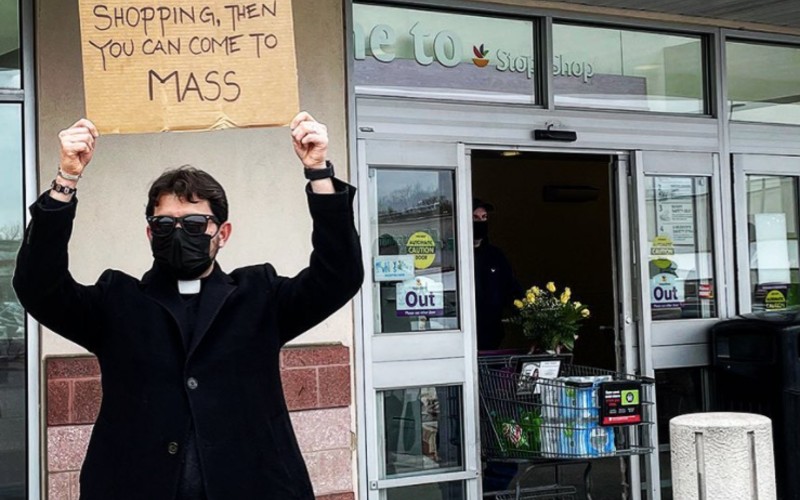 NY Priest Stands Outside Grocery Store With Sign Encouraging Catholic ...